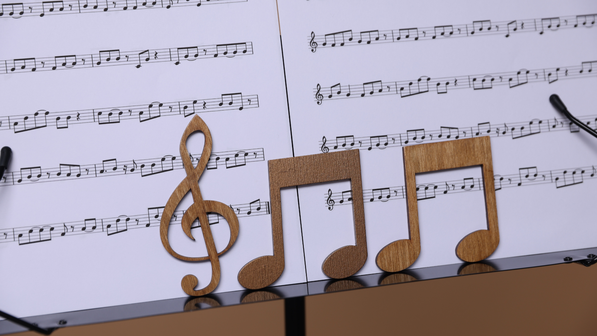 child learning guitar while reading music